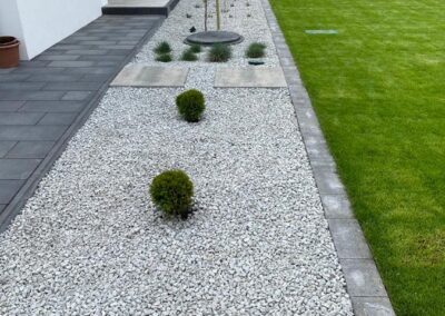 Tomaszek Ogrody Toruń ogród projekt rzeczka modernizacja strumyk kamienie zakładanie ogrodu trawnik z rolki